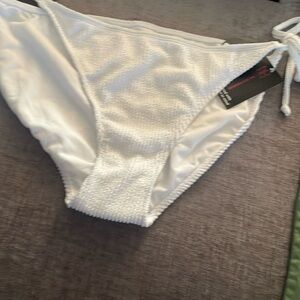 Two Bikini bottoms , new never worn , tags .